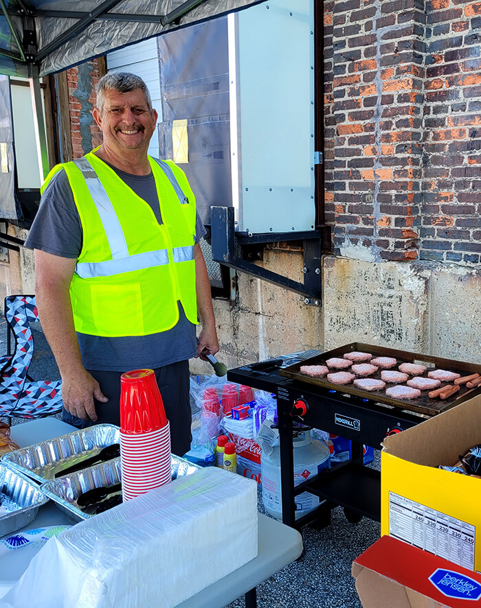 man working the grill on terminal transportation employee appreciation day