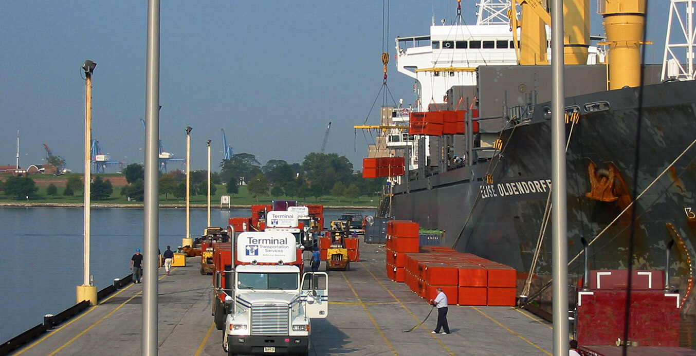 flatbed trucks loading at rukert terminals pier
